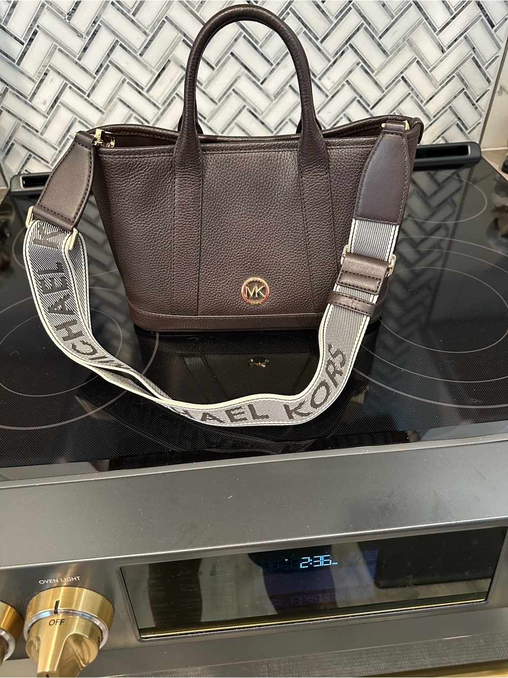 Michael Kors Luisa Small Pebbled Leather Satchel in Maple with gold hardware.